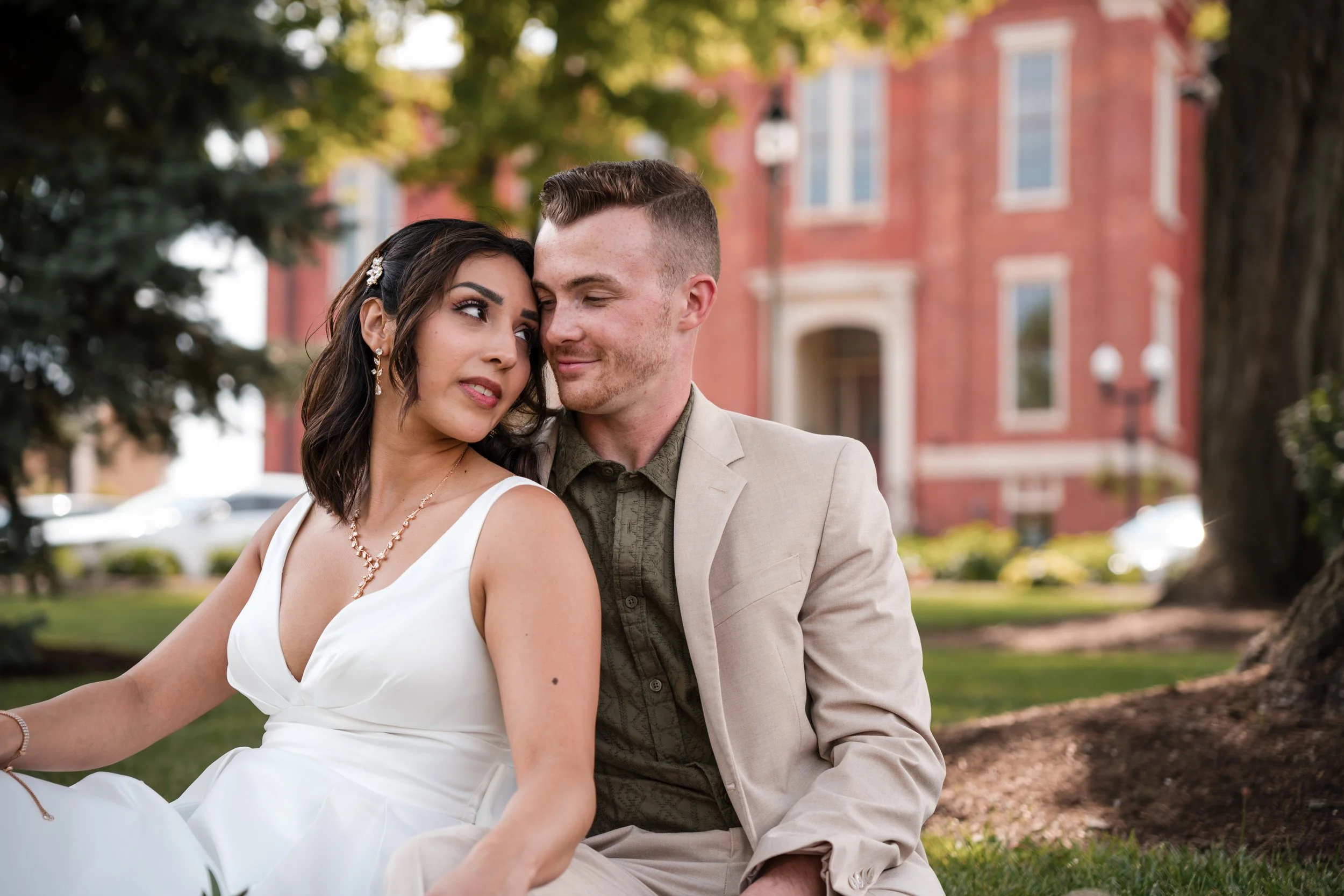 A couple sitting in a park