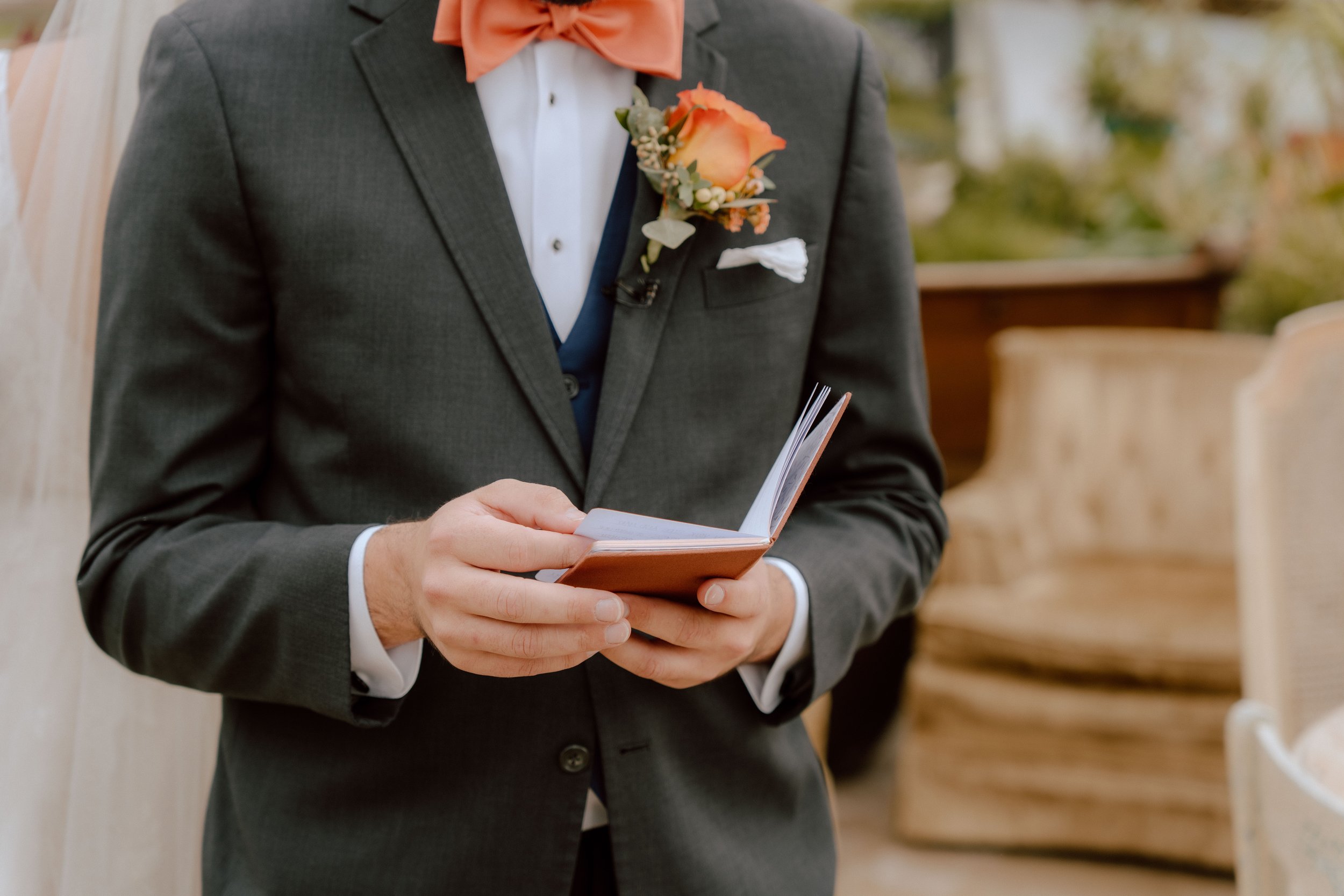 A groom reading a notebook