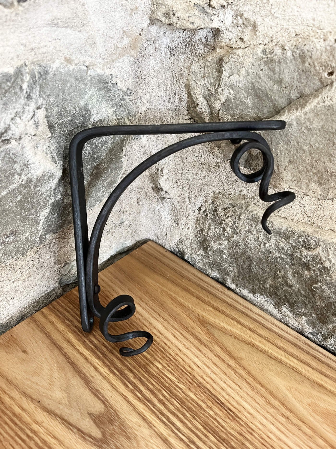 handmade forged curling vine shelf brackets