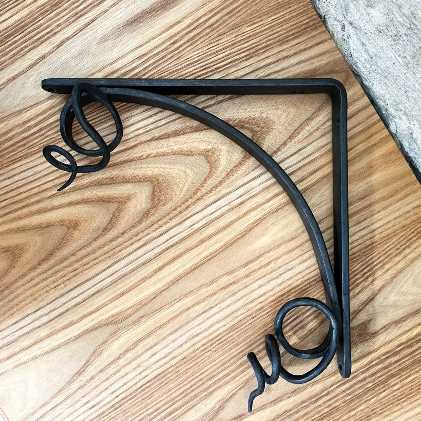 handmade blacksmith forged curling vine shelf brackets