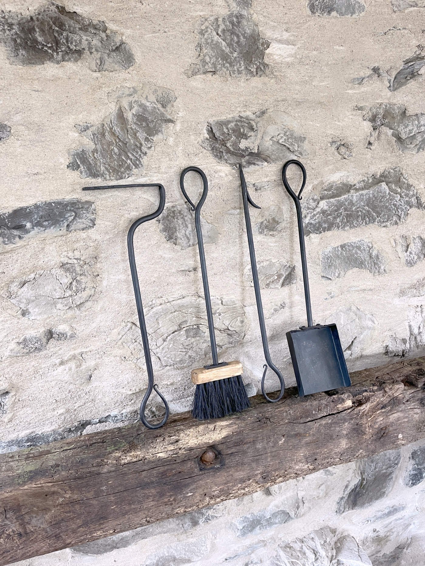 Forged vine blacksmith fireplace tool set with brush, pan, poker, and coal rake
