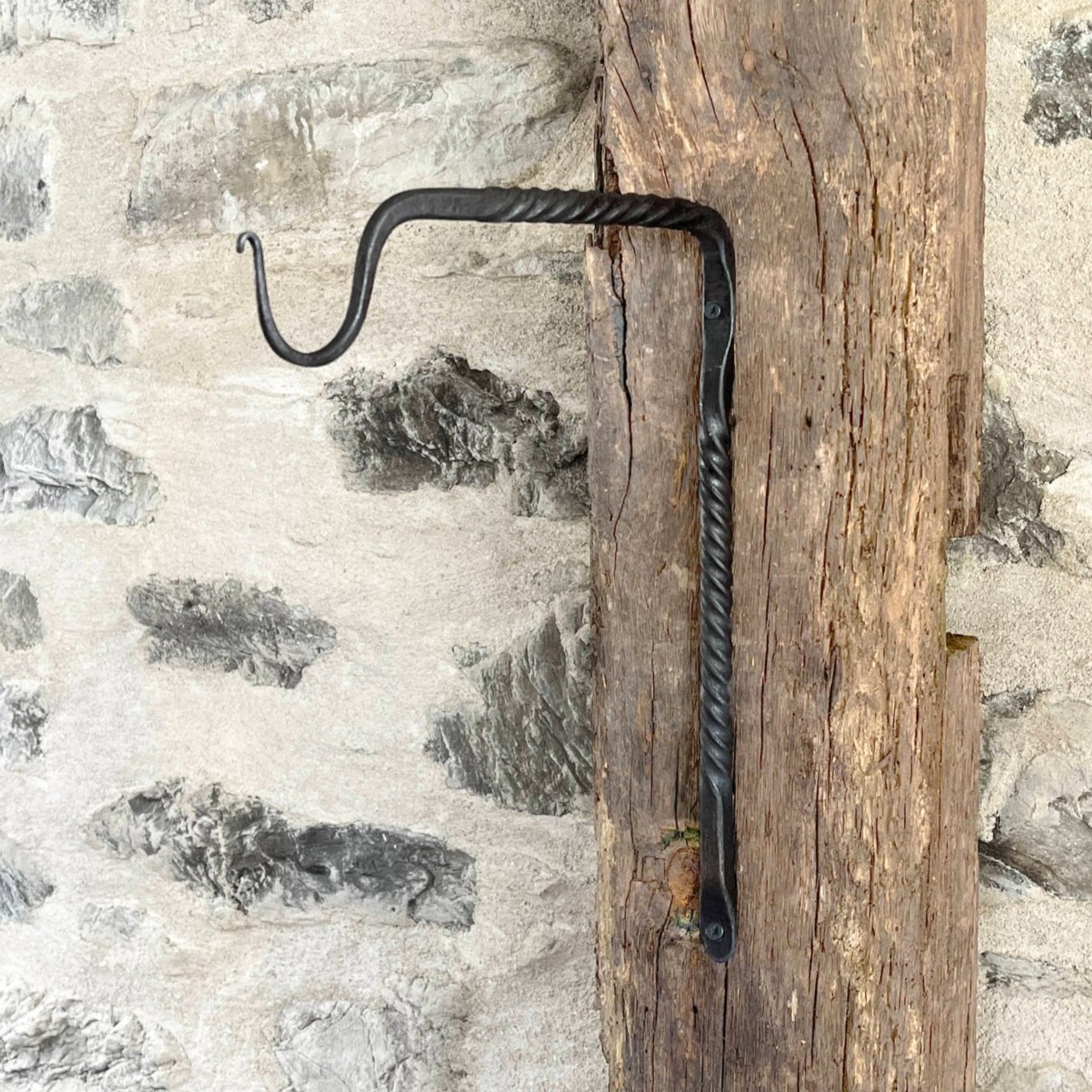 handmade forged minimal blacksmith plant hanger hook with twist design