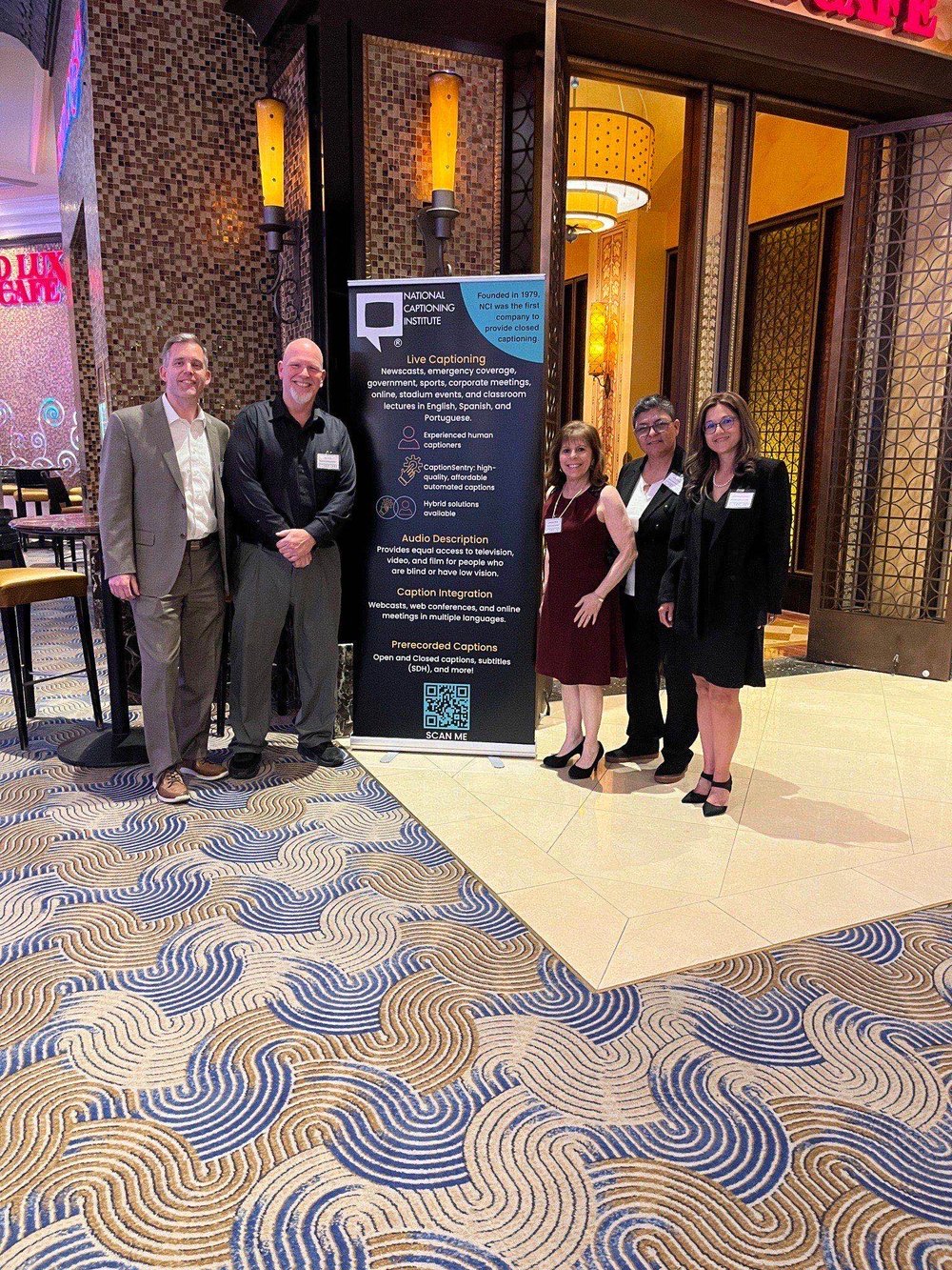 Our team outside the Grand Lux Cafe before the NCI reception.