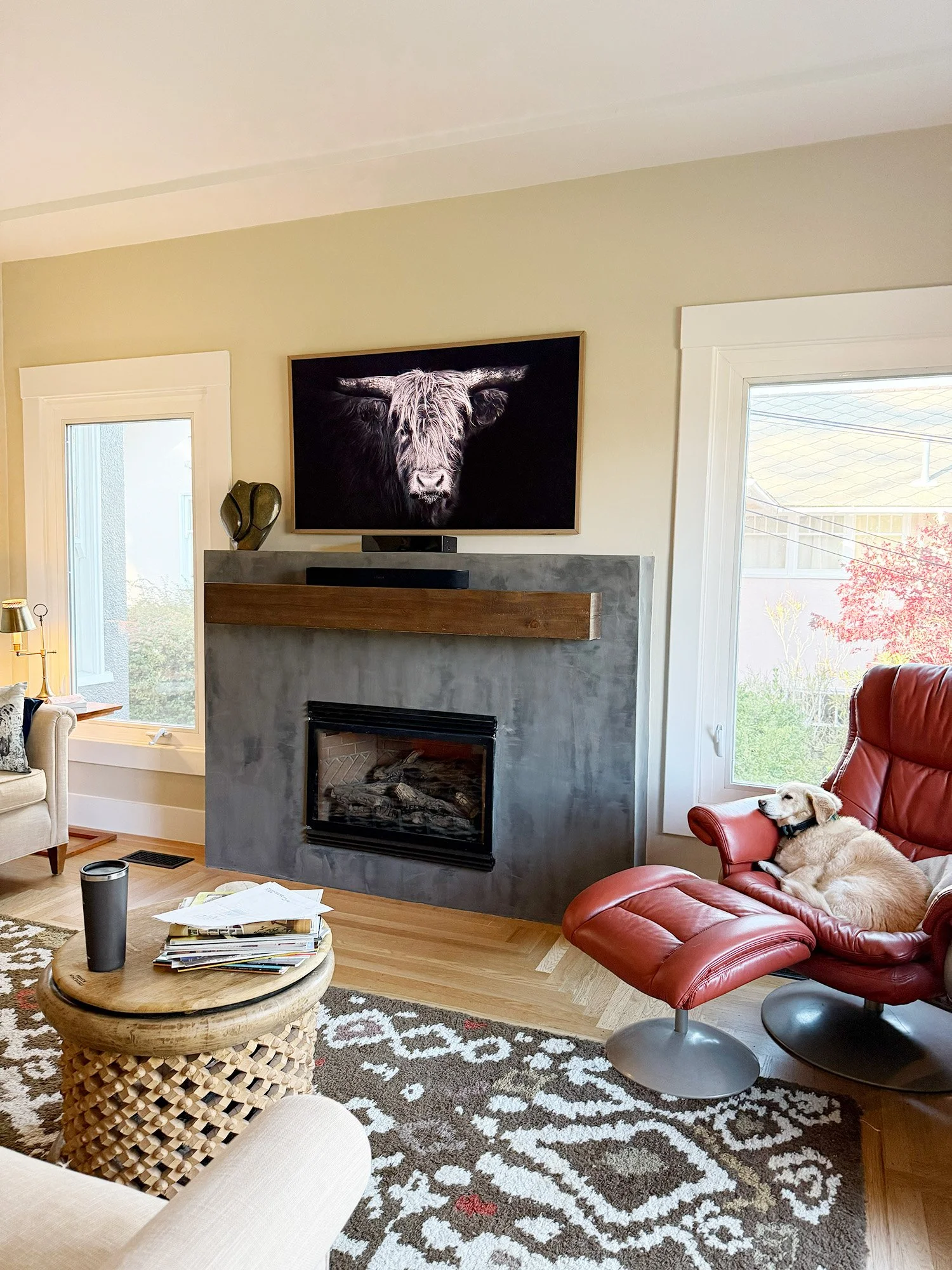 Living room with Roman clay fireplace in Sebastopol home