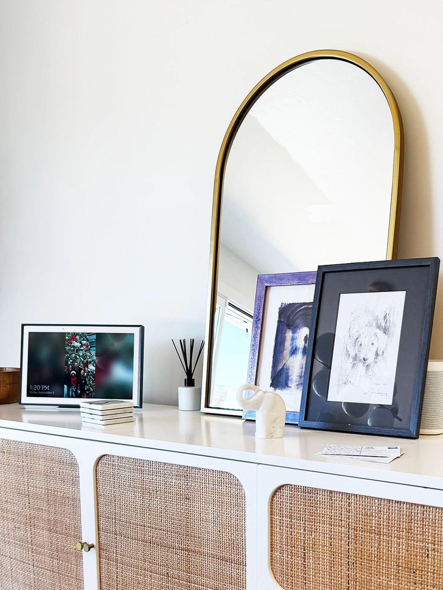 Sideboard with art and layered styling in Corte Madera home