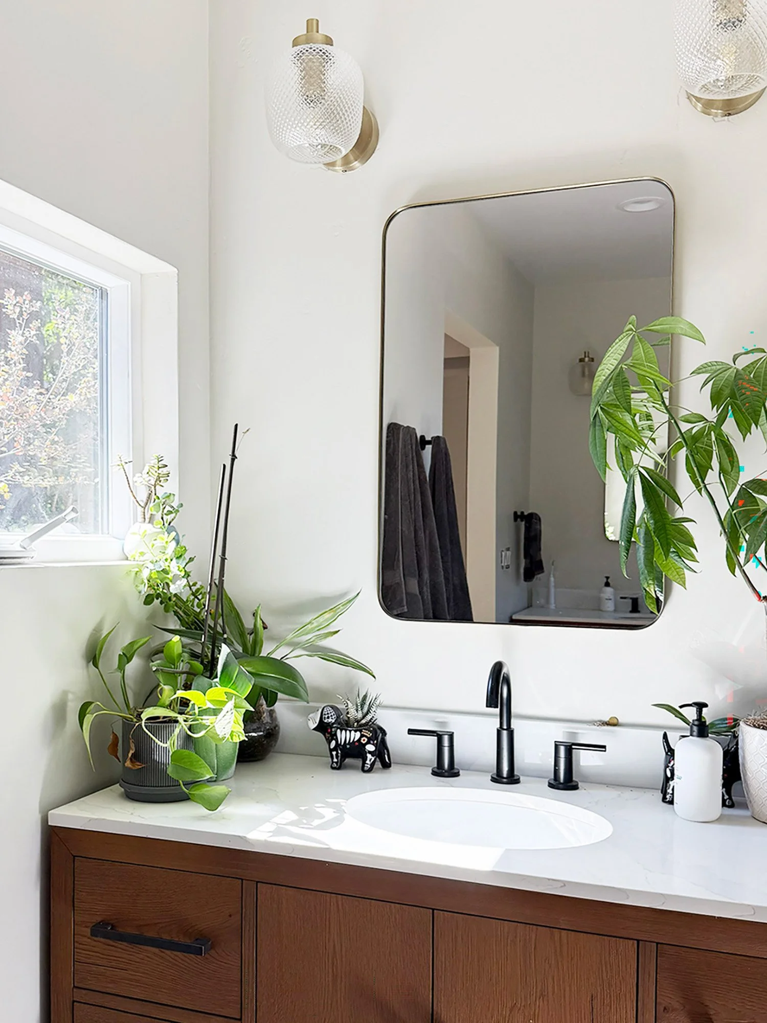 Bathroom vanity with wood cabinetry and soft natural light in Sebastopol