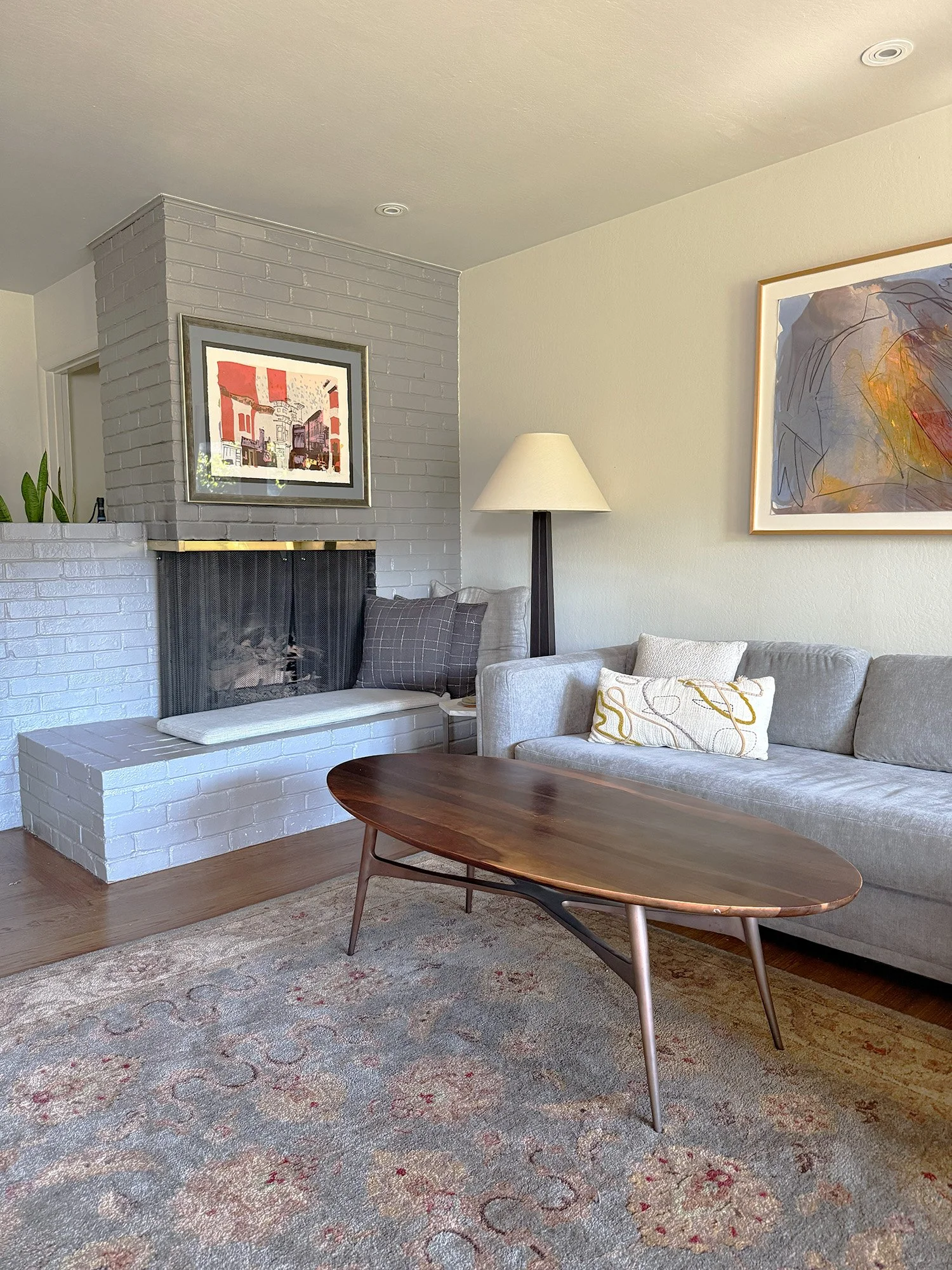 Living room with fireplace and neutral seating in Corte Madera