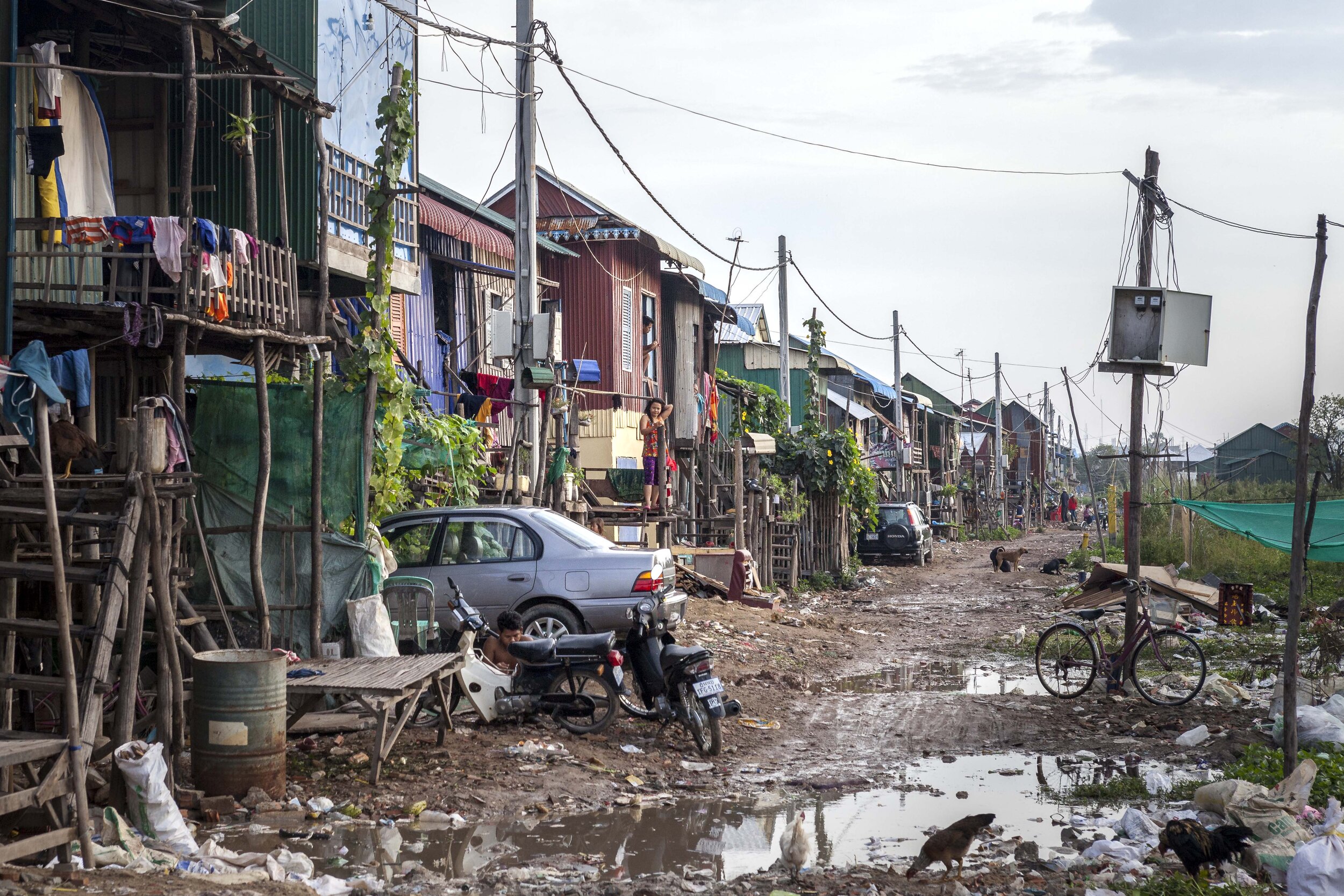  The peninsula that juts into Beong Tompun lake is just wide enough for rough road access and a single line of stilt houses in Prek Takong village. 