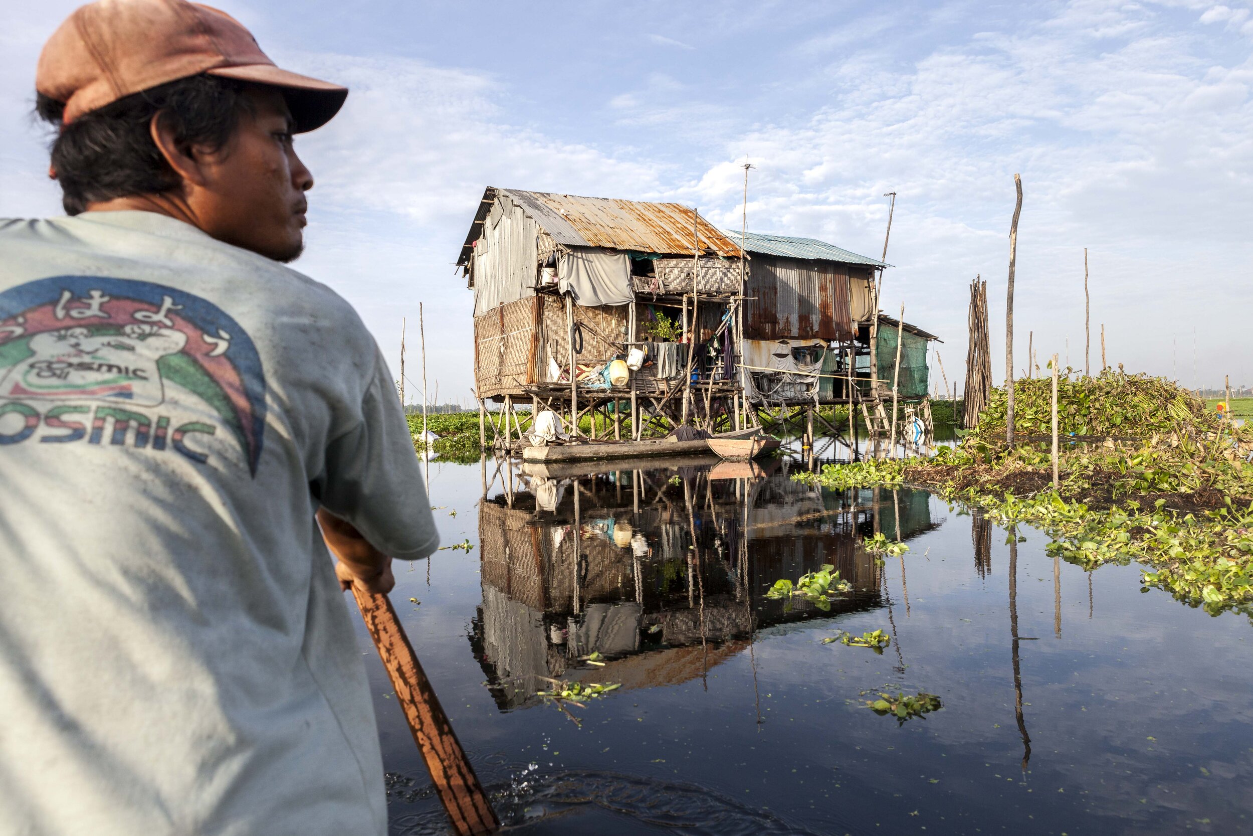 Some residents of Boeng Tompun  live in stilt houses entirely surrounded by the lake water, and commute by canoe to work, school, and markets. 