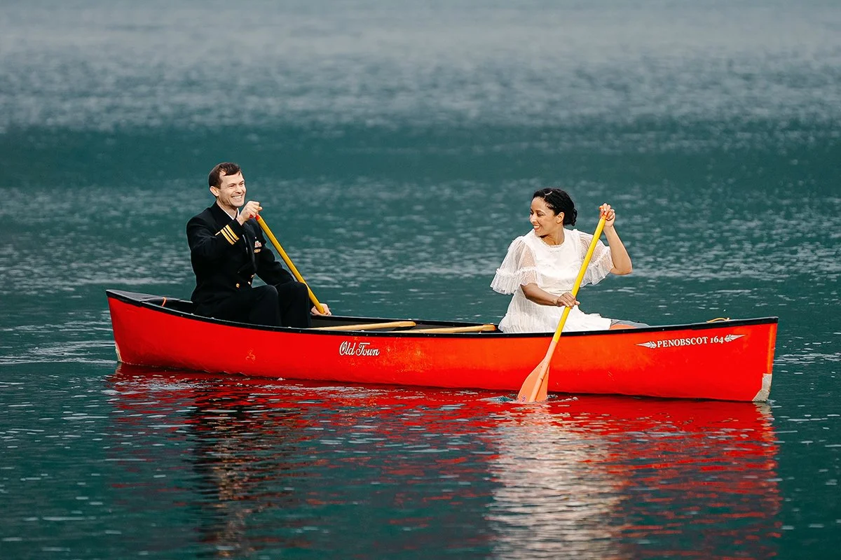 couple canoeing on their elopement at orca island washington