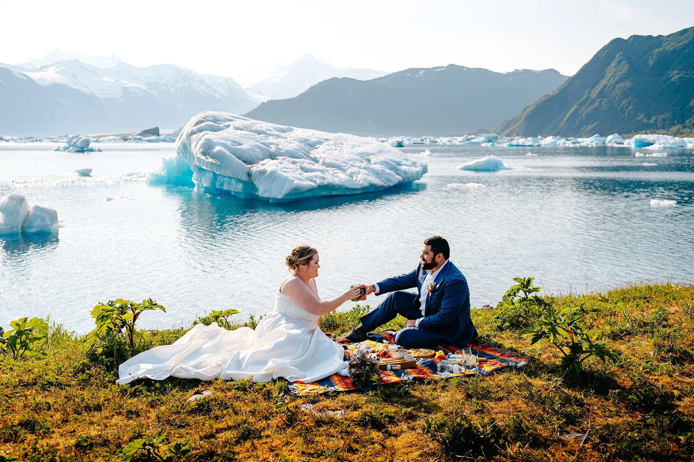 couple enjoying a picnic at bear glacier Alaska
