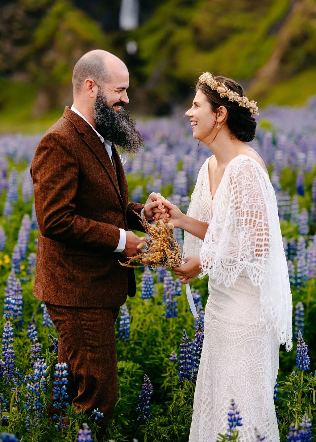 couple exchanging vows in iceland on their elopement