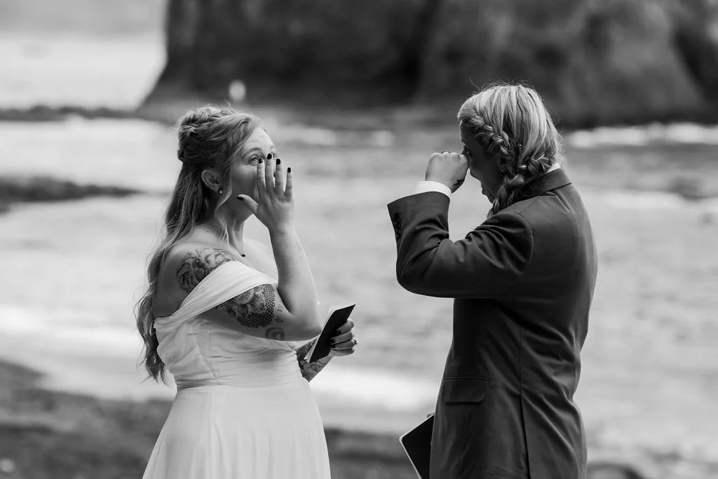 couple crying during emotional vow exchange