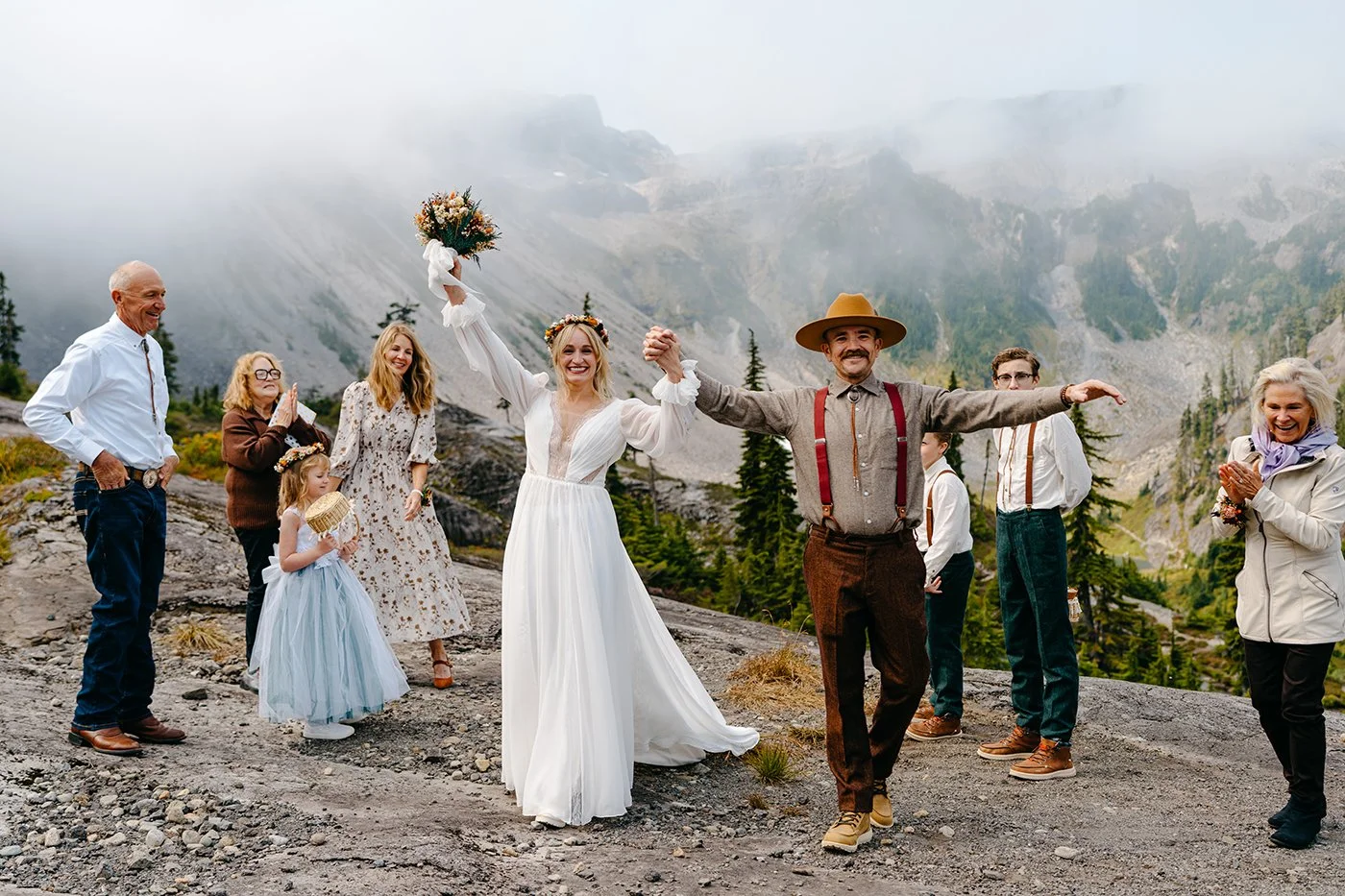 couple celebrating after their ceremony during a micro wedding outdoors