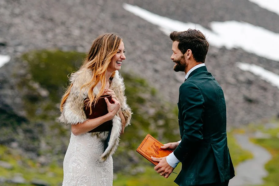 couple laughing while exchanging vows in the north cascades