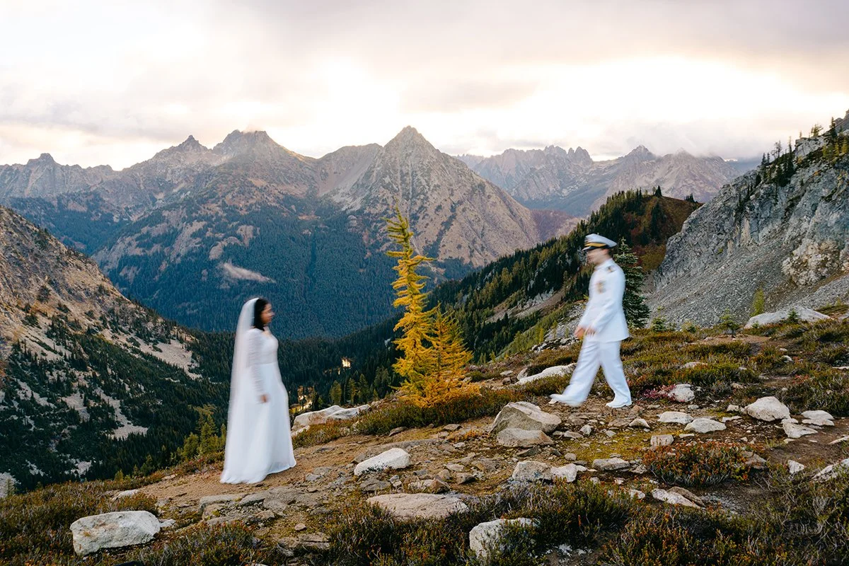 couple eloping at maple pass loop during fall with larches
