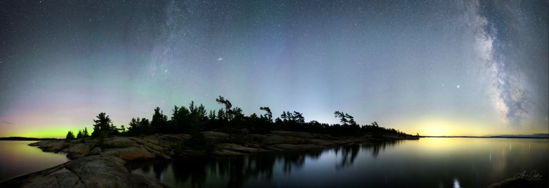 Wall Island panorama with Milky Way and Aurora Borealis