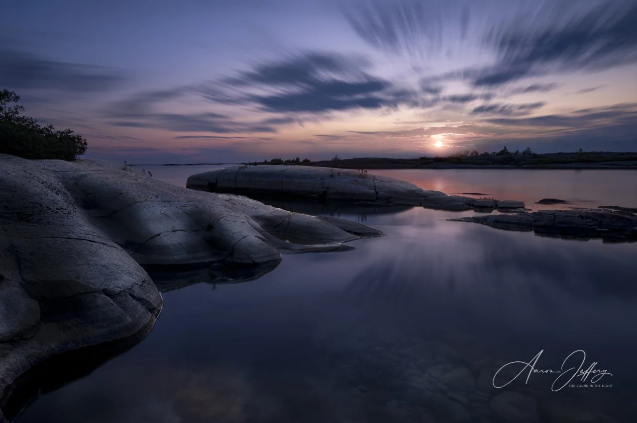 Sunset on the Rocks. Long exposure photography on the shores of Georgian Bay near Pointe au Baril, Ontario