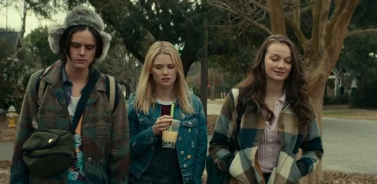 Allyson walking to school with her friends in Halloween 2018