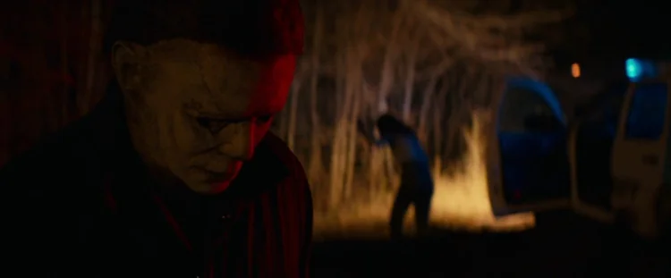 Allyson escaping while Michael Myers attacks Doctor Sartain