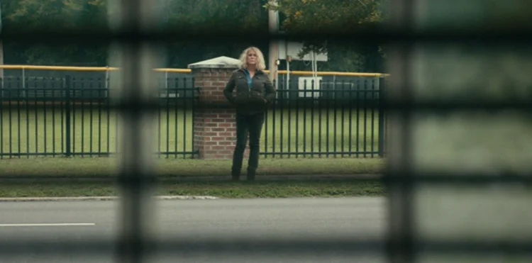 Laurie Strode standing outside Allyson's school in Halloween 2018