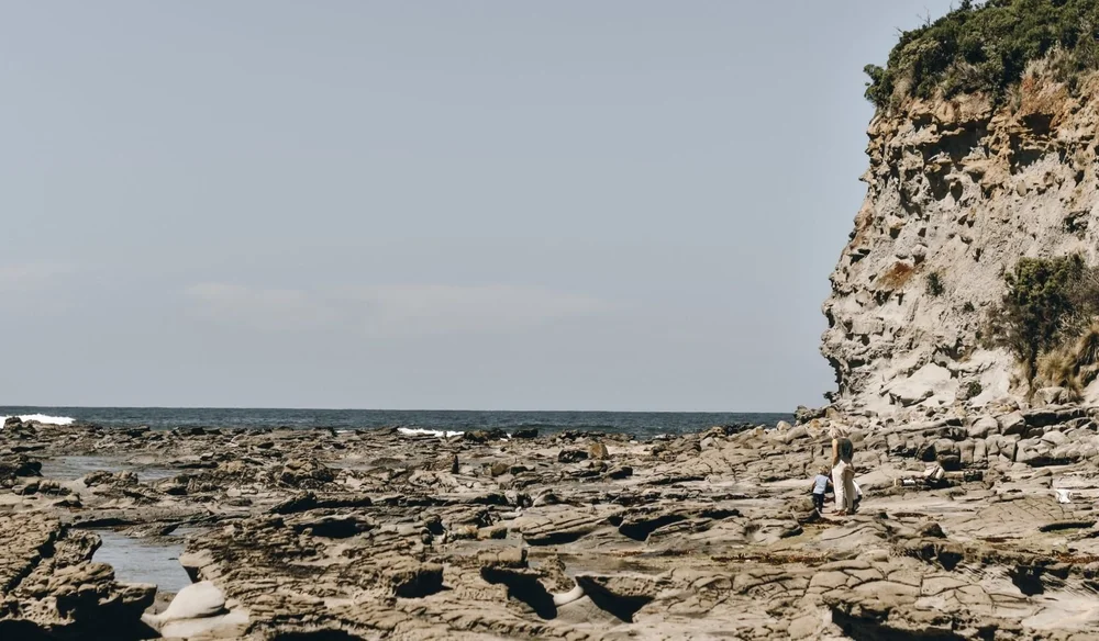 The-Caves-beach-Inverloch-Dinosaur-Dreaming-dig-site-family-on-rock-platform_d0fac39c089a8a5df7376751f4812439.jpeg