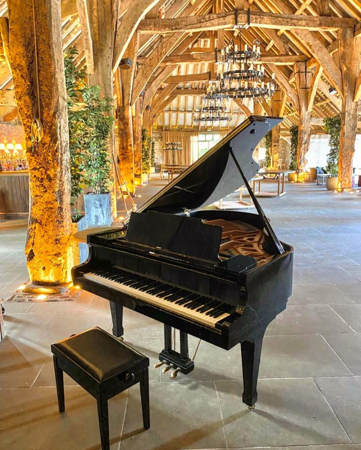 grand piano set up in a venue