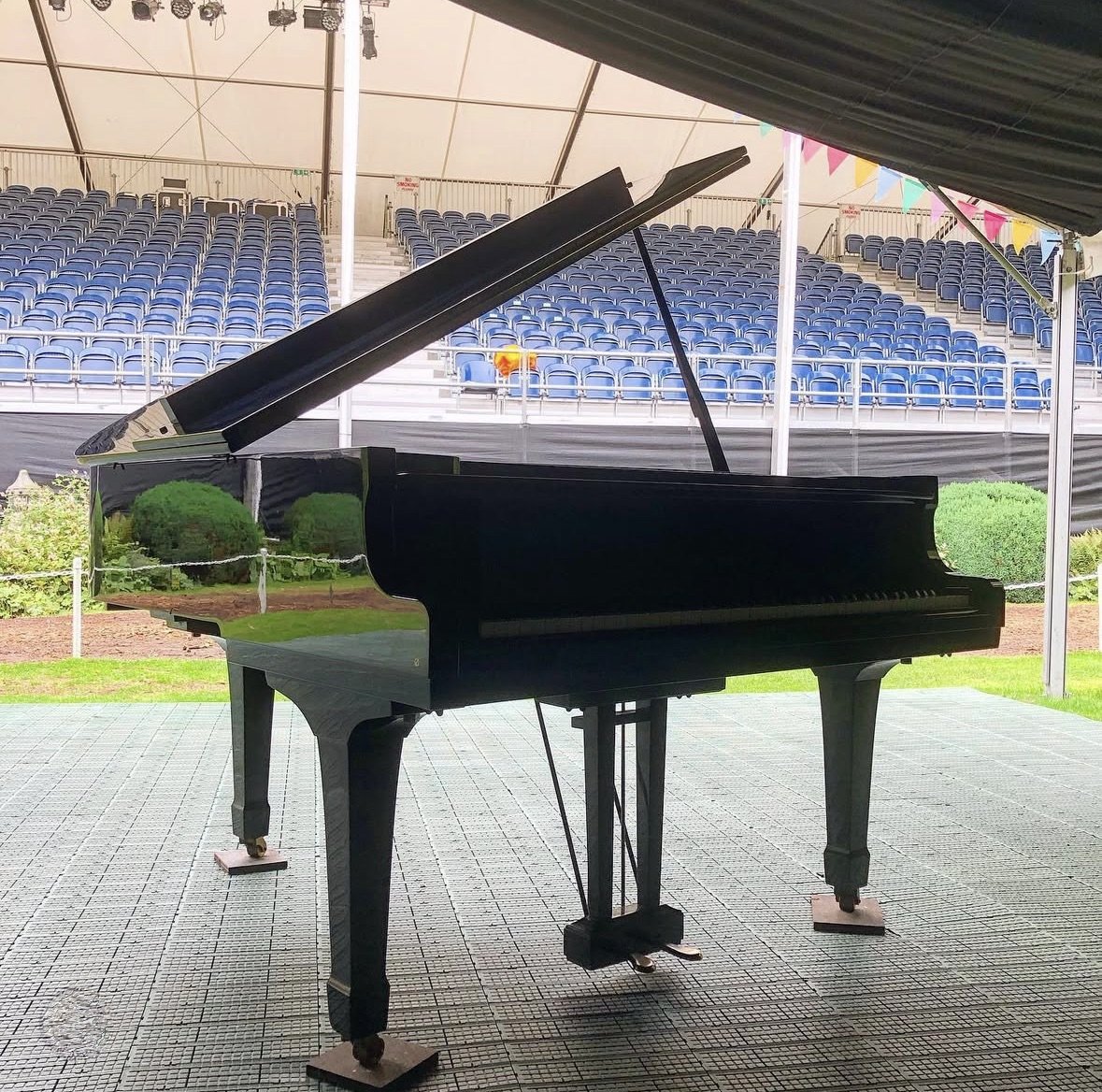 grand piano set up ready for a festival