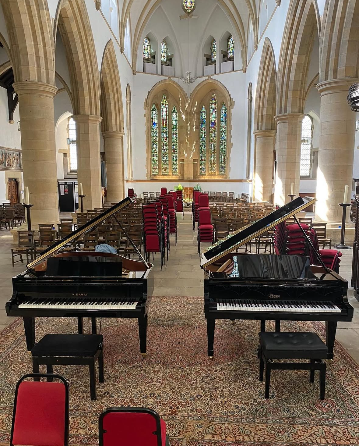 two grand pianos in a church