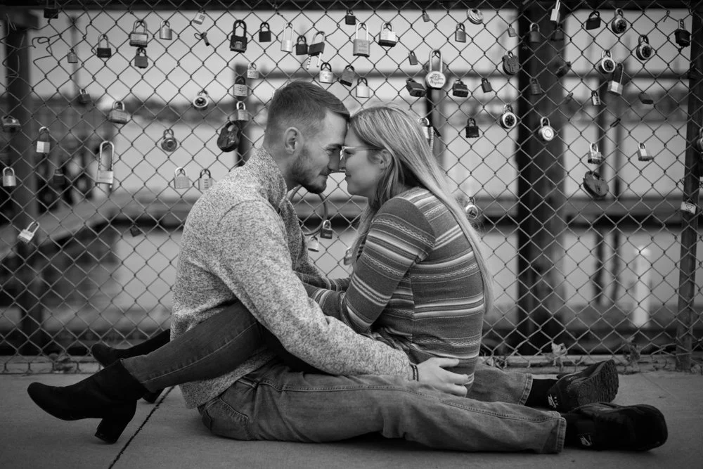 Engaged couple holding each other at Prescott Park