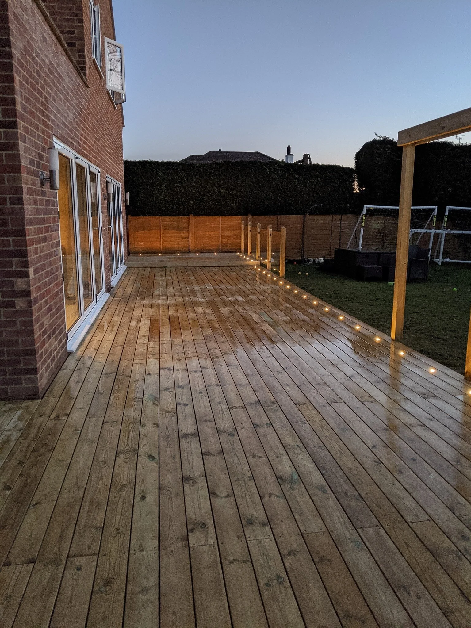Decked area with glass balustrade