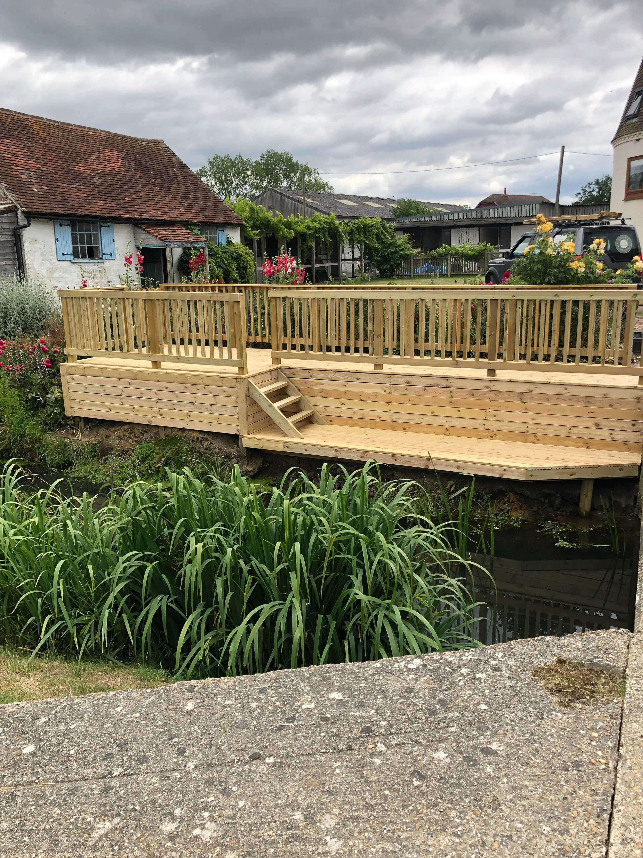 Deck replacement by a peaceful stream