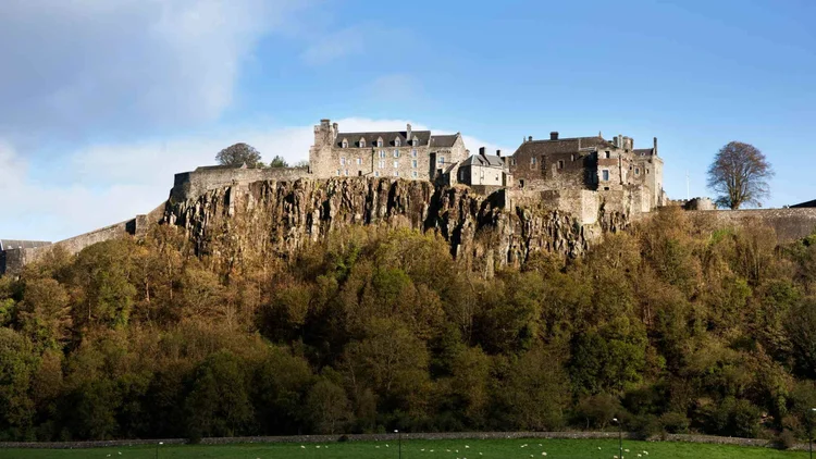Stirling Castle on its crag above the trees