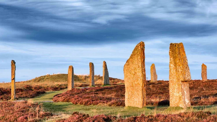 The Ring of Brodgar standing stones under a big Orkney sky, on the 3-day Orkney tour from Inverness