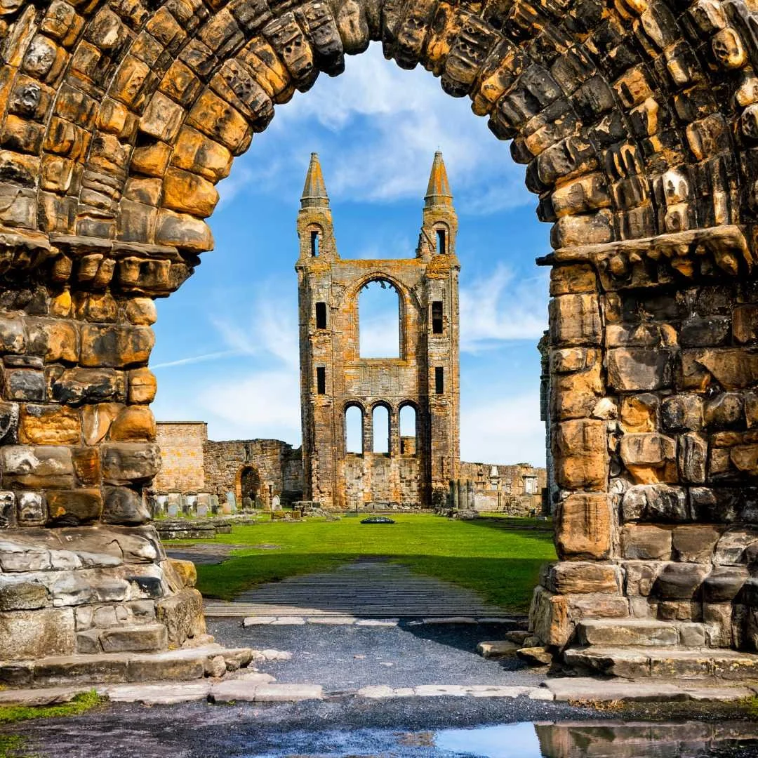Ruins of St Andrews Cathedral framed by a medieval arch