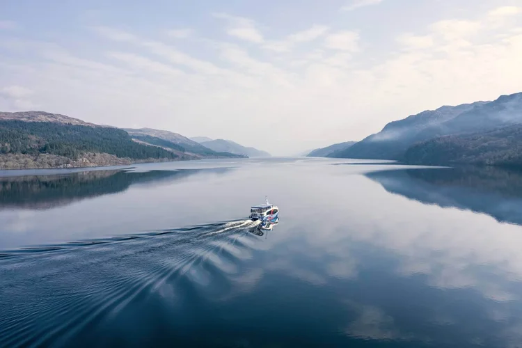 Boat travelling across Loch Ness