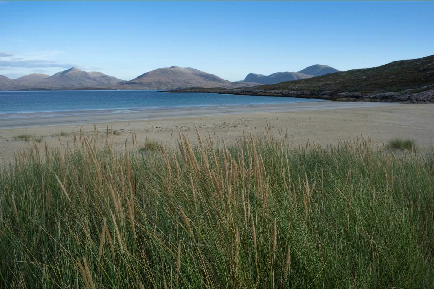 White-sand beach and mountains on the Isle of Harris