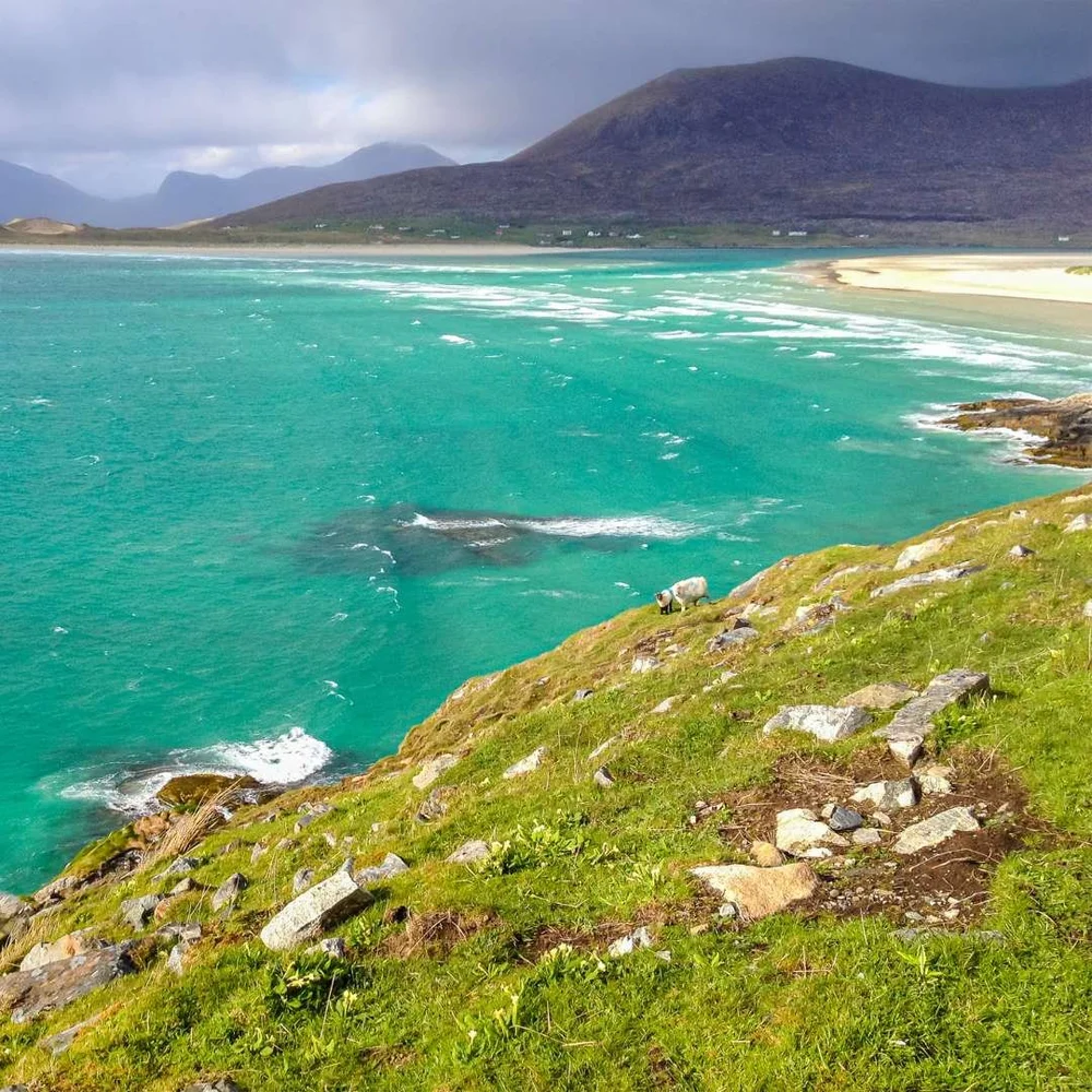 Turquoise water and white sand on the coast of the Isle of Harris