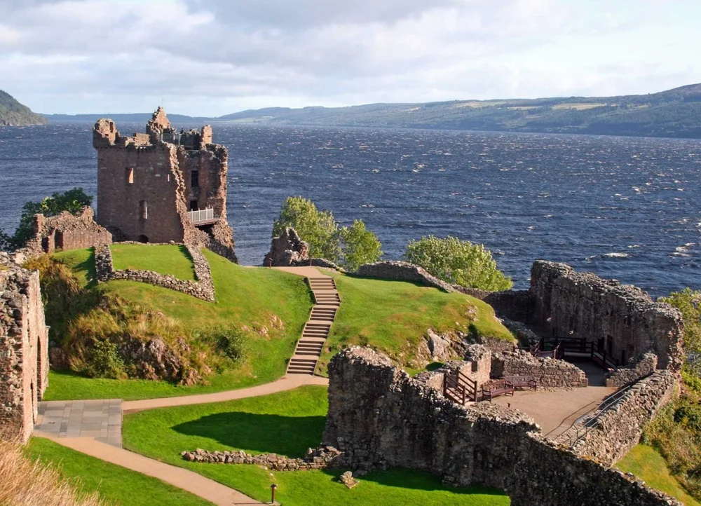 The ruins of Urquhart Castle on the shore of Loch Ness