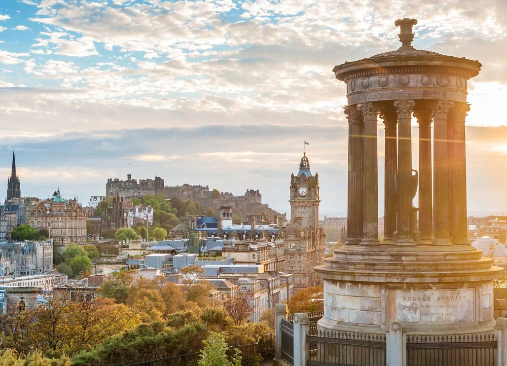 Edinburgh Castle and the Old Town seen from Calton Hill beside the Dugald Stewart Monument