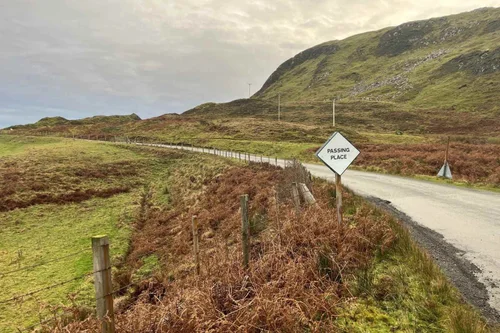 A single-track road winding across the Isle of Skye