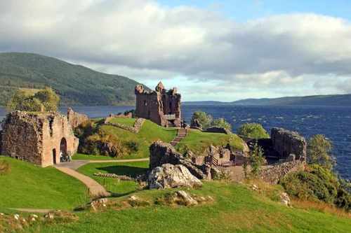 The Grant Tower of Urquhart Castle on its point above Loch Ness