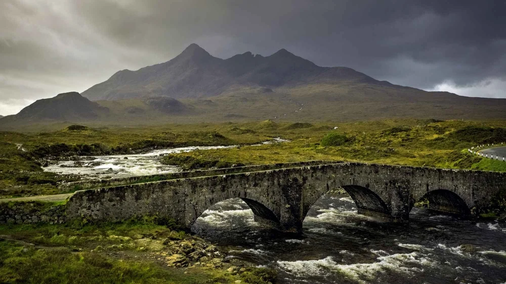 The old stone bridge at Sligachan below the Cuillin, the last stop on the Isle of Skye day trip from Inverness