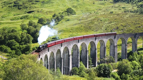 The Jacobite steam train crossing the Glenfinnan Viaduct