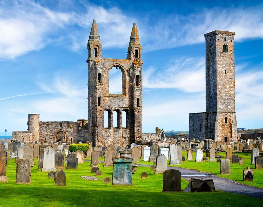Historic ruins in St Andrews under blue skies