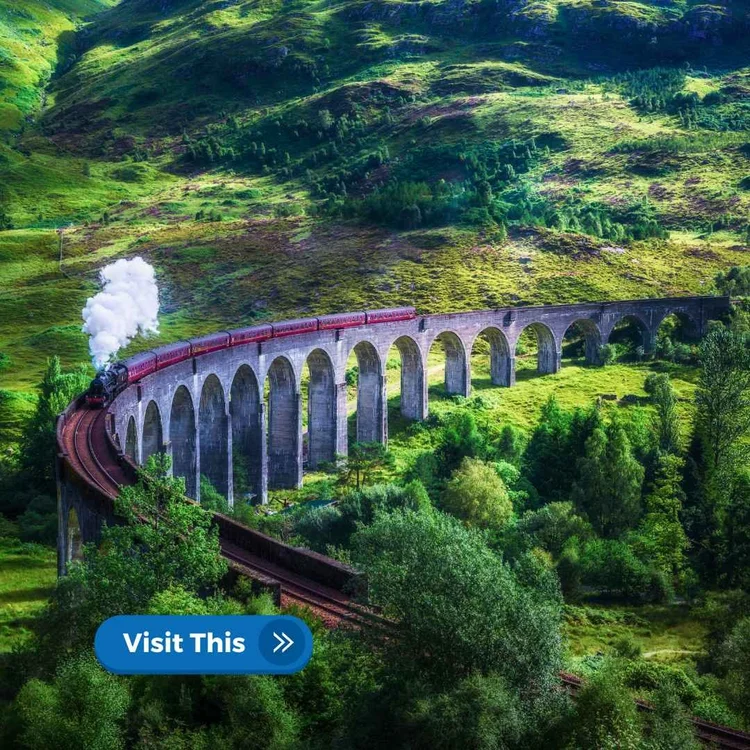 A steam train crossing the Glenfinnan Viaduct