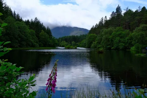 Mountains reflected in a loch in Glencoe