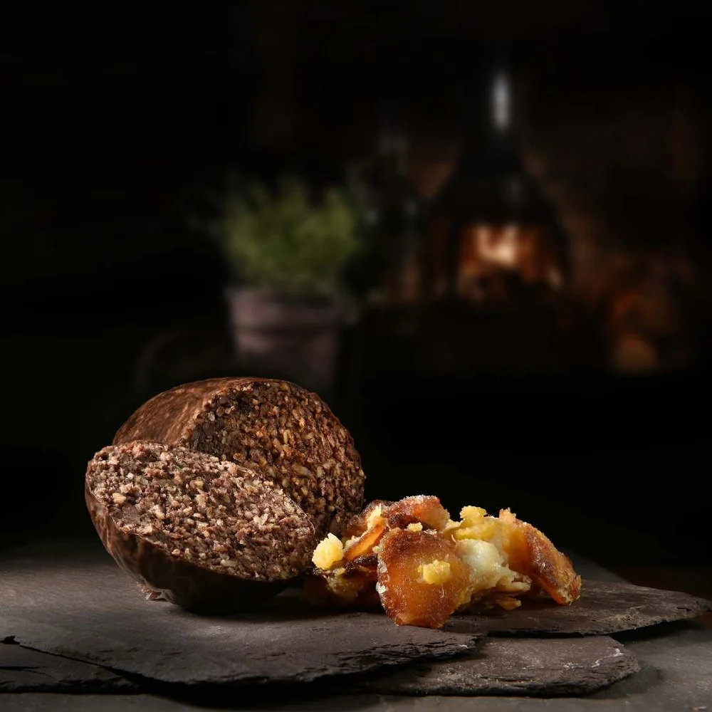 Haggis served with neeps and tatties