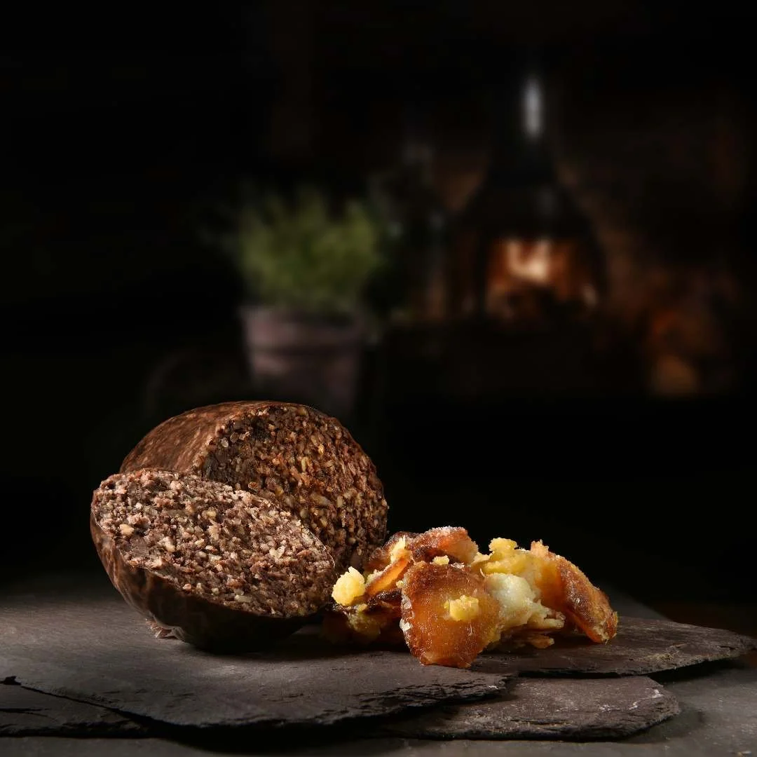Traditional haggis served with neeps and tatties