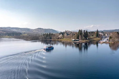 A cruise boat coming into Fort Augustus at the southern end of Loch Ness